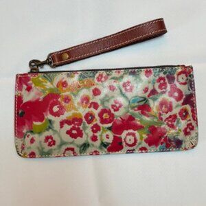 Patricia Nash clutch purse, multi-colored with flowers.